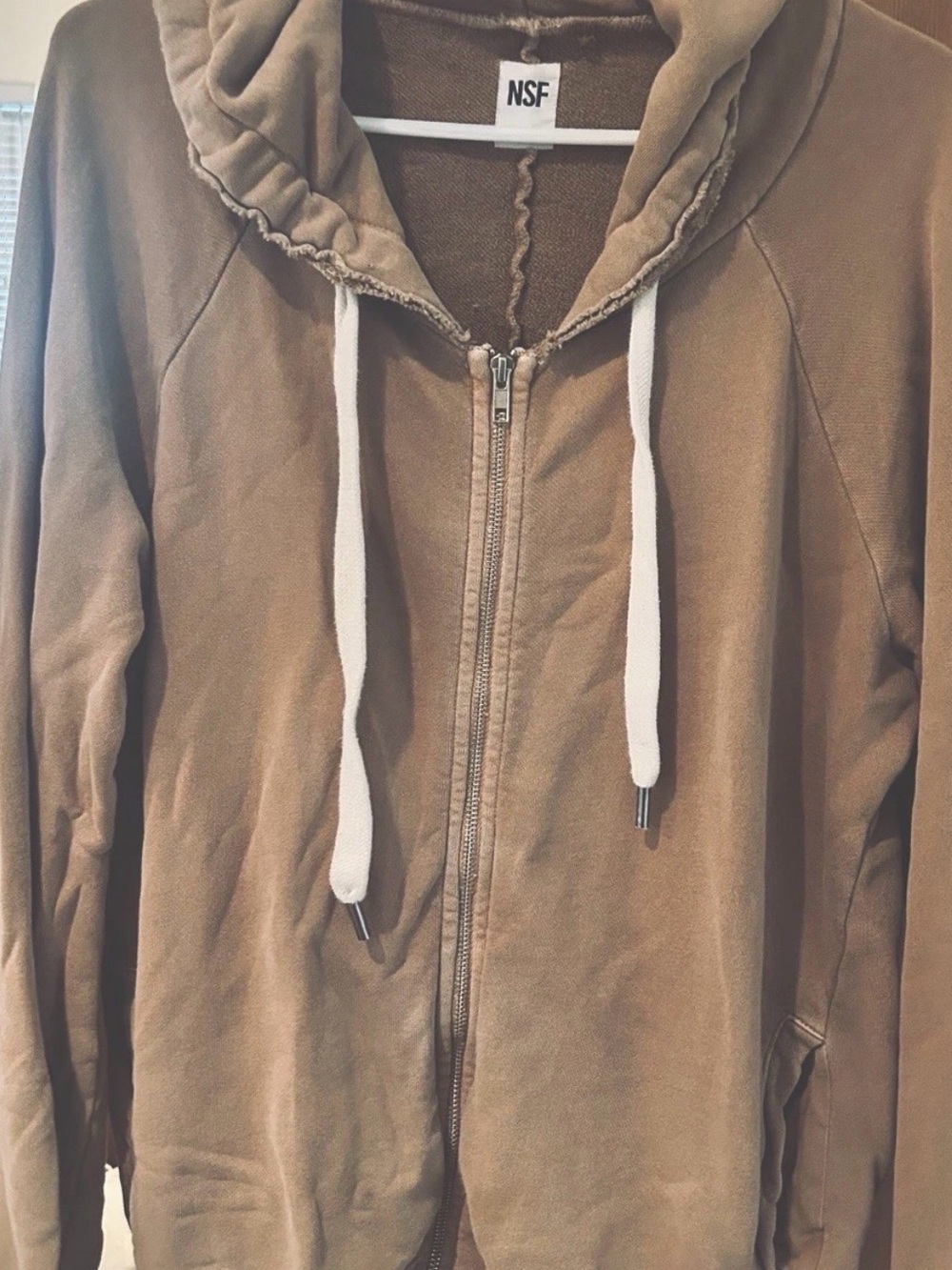 NSF womans Zip-Up Hoodie in a tan color, safari with White Drawstrings.